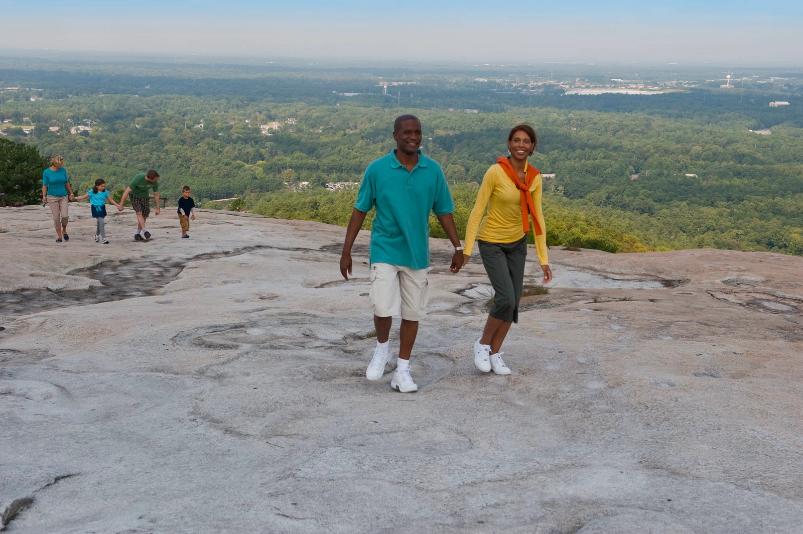 family on top of the mountain